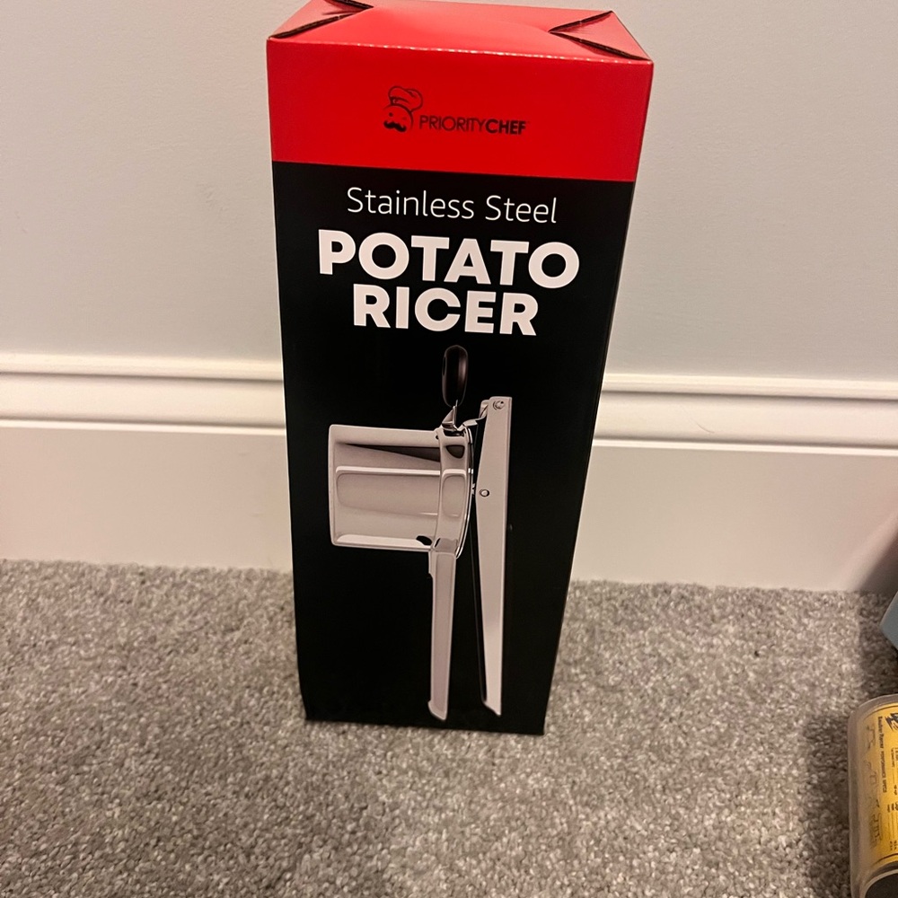 Stainless Steel Potato Ricer - Black Handle